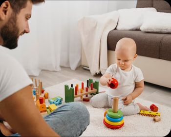 Teacher and Infant Playing