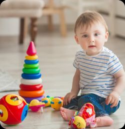 infant child with toys