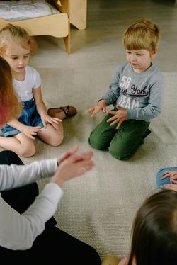 three toddlers learning to count